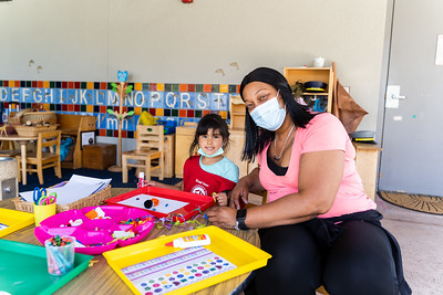 child development teacher and child interaction