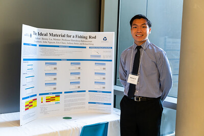 student presenting a sustainabilty trifold